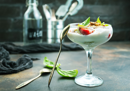 Fresh strawberry with banana kiwi and white cream. Organic food.の写真素材