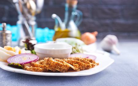 baked meat with salad and sauce, diet foodの写真素材
