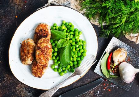 fried cutlets with green pea, cutlets with peaの写真素材