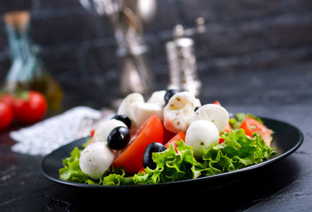 Vegetable salad on plate, greek salad, fresh salad with feta cheeseの写真素材