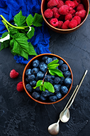 fresh raspberry and blueberry in bowl, fresh berries in bowlの写真素材
