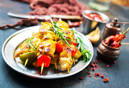 chicken kebab with vegetables, kebab on metal plateの写真素材