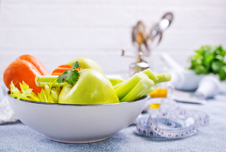 ingredients for diet salad, apples and celery and fresh carrotsの写真素材