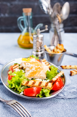 caesar salad, fresh salad with vegetable and chickenの写真素材