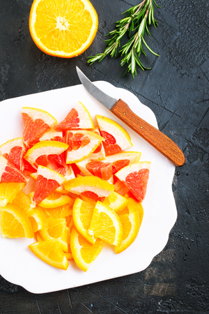 Fresh citrus on plate, citrus slice on plateの写真素材