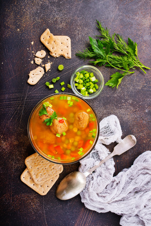 fresh soup with vegetables and meat ballsの写真素材