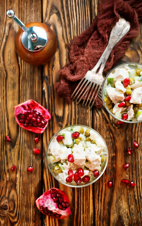 salad with chicken in glasses, salad with chicken egg peasの写真素材