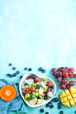 fruit salad, fresh salad with fruits and berriesの写真素材