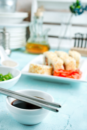 Delicious sushi rolls with rice, chuka and sauceの写真素材