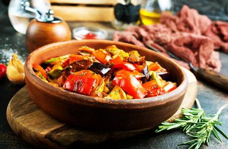 baked vegetables in bowl on a tableの写真素材