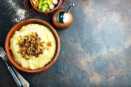 mashed potato with fried onion in bowlの写真素材