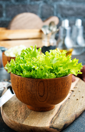 salad leaf in bowl on a tableの写真素材