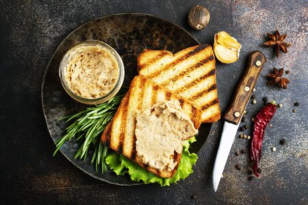 bread with liver pate on plate, delicious poultry liver pateの写真素材