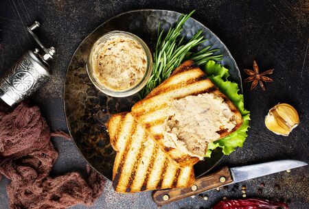 bread with liver pate on plate, delicious poultry liver pateの写真素材