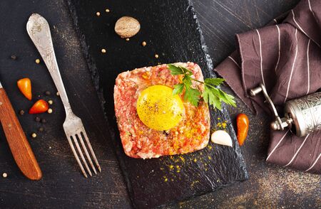 fresh tartar with spice and yolk, meat tartarの写真素材