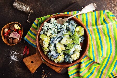 fried colorfull cauliflower with eggs and cheeseの写真素材
