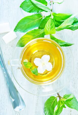 jasmin tea in glass cup and on a tableの写真素材