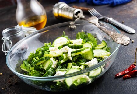 fresh salad with cucumbers and feta cheeseの写真素材