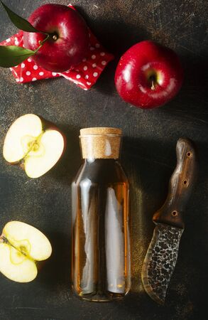 apple juice from fresh apples, red aaples and juiceの写真素材