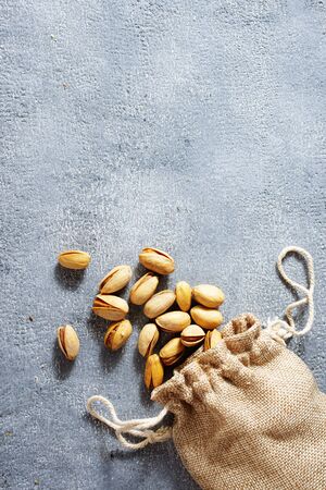 pistachio on a yable, dry pistachio, superfoodの写真素材