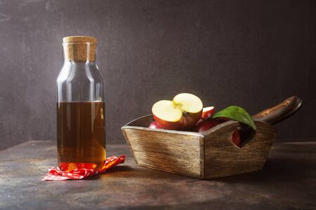 apple juice from fresh apples, red aaples and juiceの写真素材