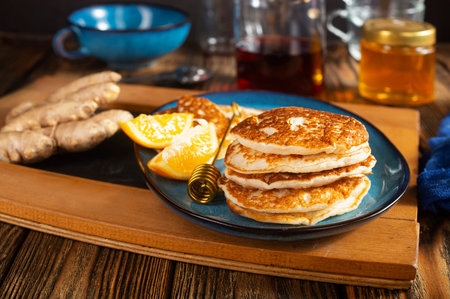  homemade classic american pancakes with honey and tea