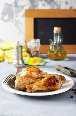 fried chicken legs with oil and aroma spiceの写真素材
