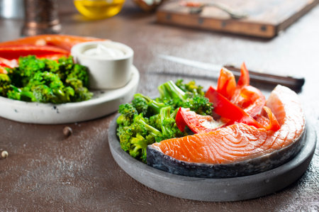 Ripe fig fruits with fig leaves on the brown backgroundの写真素材