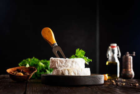 Camembert cheese. Round brie or camambert cheese. Selective focusの写真素材