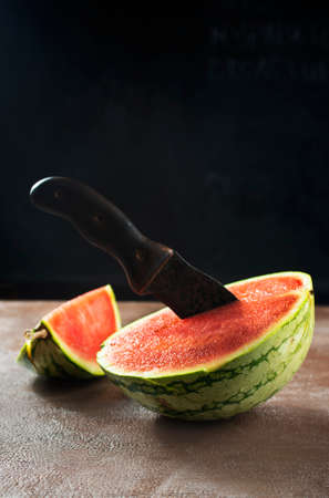 Fresh sliced watermelon on dark backgroundの写真素材