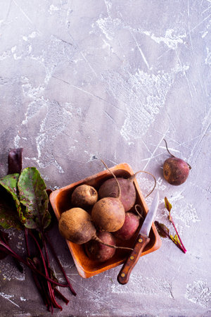 Fresh organic beet, beetroot. Gray rustic wooden background. close up.の写真素材