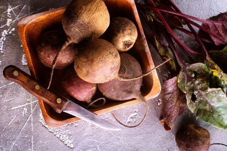 Fresh organic beet, beetroot. Gray rustic wooden background. close up.
