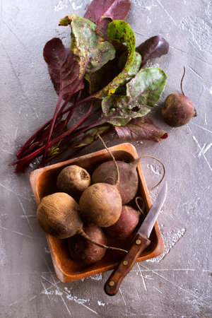 Fresh organic beet, beetroot. Gray rustic wooden background. close up.の写真素材