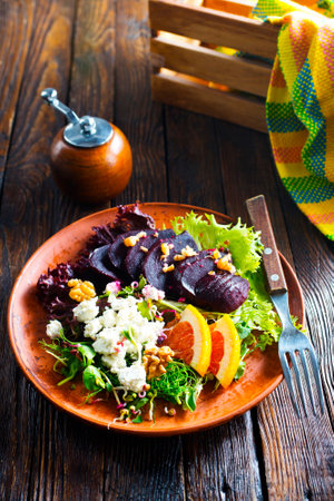 Beet with goat cheese and nuts. top viewの写真素材