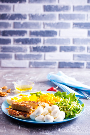 breakfast with eggs, sprouts, mozzarella and cornの写真素材