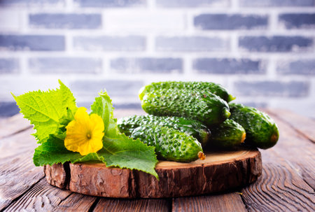 Cucumber on wooden board and vintage background.の写真素材