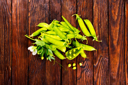 Beautiful closeup of green fresh peas and pea pods. Healthy foodの写真素材