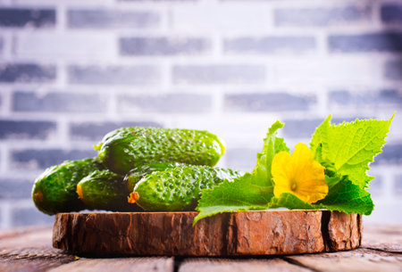 Cucumber on wooden board and vintage background.の写真素材