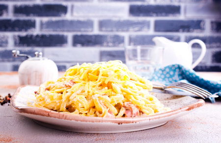 Pasta Carbonara with bacon and parmesan on plate.の写真素材