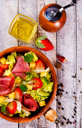 Iberian Ham, Strawberries and vegetables. Restaurant menu, dieting, cookbook recipe top view.の写真素材