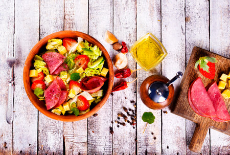 Iberian Ham, Strawberries and vegetables. Restaurant menu, dieting, cookbook recipe top view.の写真素材