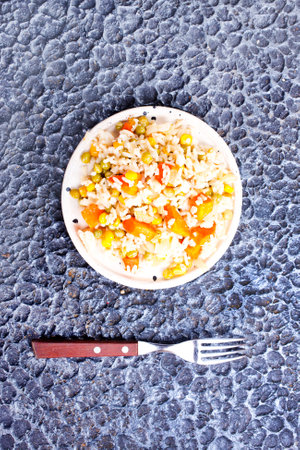 salad with bulgur, parsley and vegetables, top viewの写真素材
