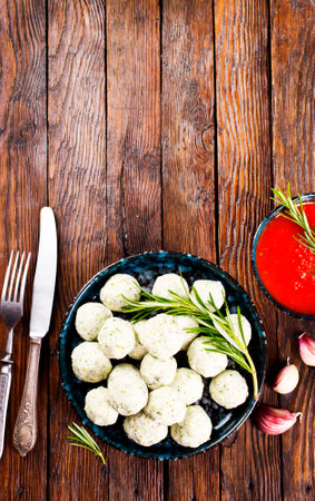 Meat balls with broccoli on plate.の写真素材