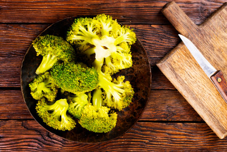 Healthy Green Organic Raw Broccoli on plateの写真素材
