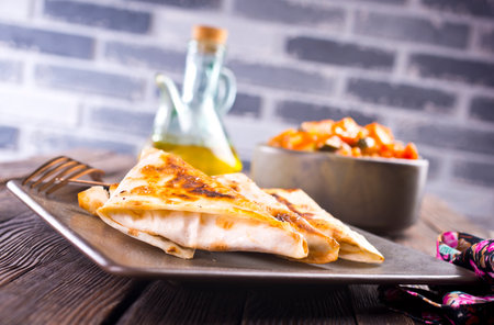 fresh roll of lavash chicken beef with grilled meat mushrooms cheese.の写真素材