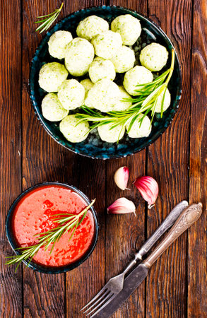 Meat balls with broccoli on plate.の写真素材