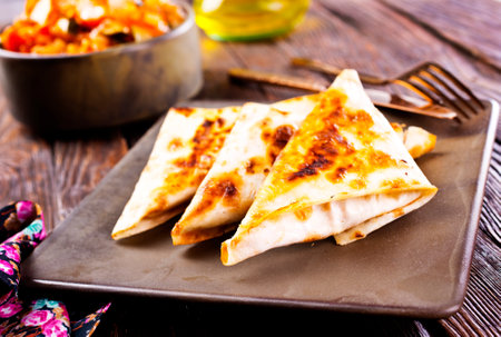 fresh roll of lavash chicken beef with grilled meat mushrooms cheese.の写真素材