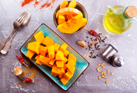 raw pumpkin on a table, stock photoの写真素材