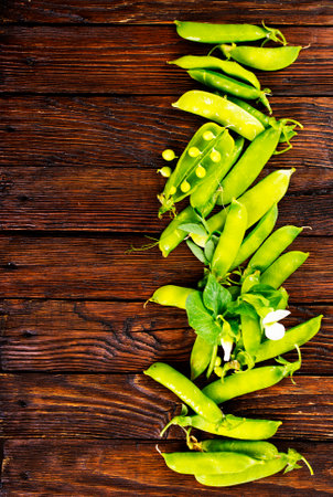 Beautiful closeup of green fresh peas and pea pods. Healthy foodの写真素材