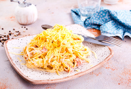 Pasta Carbonara with bacon and parmesan on plate.の写真素材